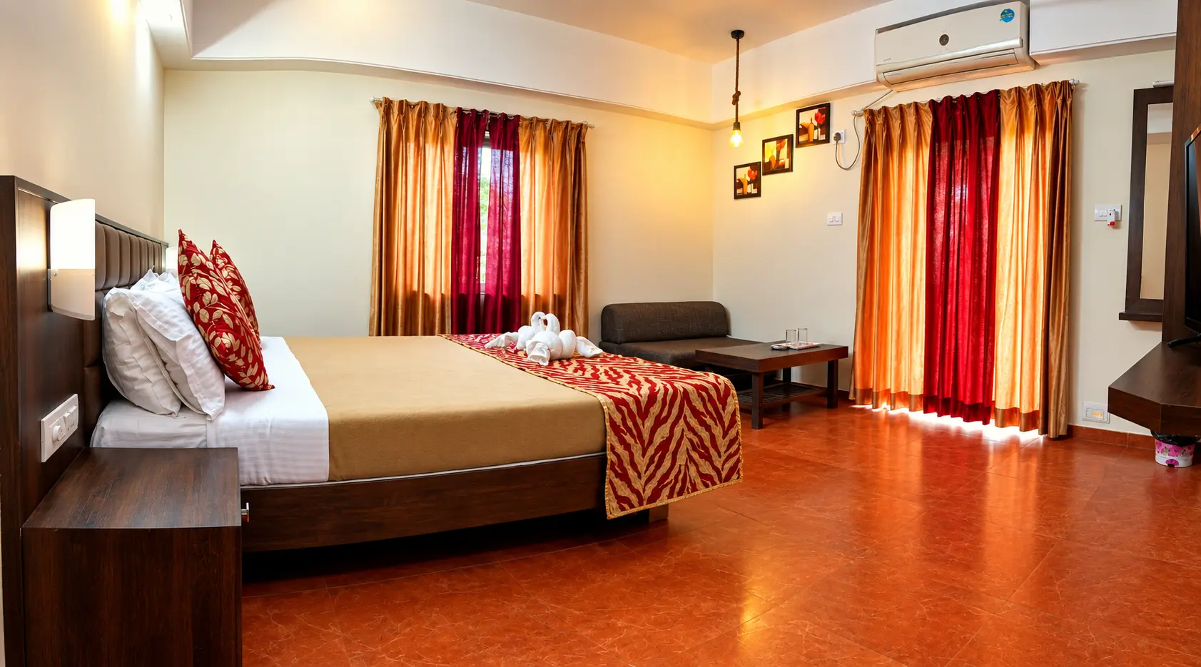 Couple room interior with seating at Hotel Viva Baga